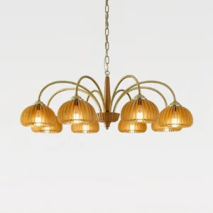 Overhead view of multi-arm pumpkin chandelier showing symmetrical ribbed glass shade arrangement
