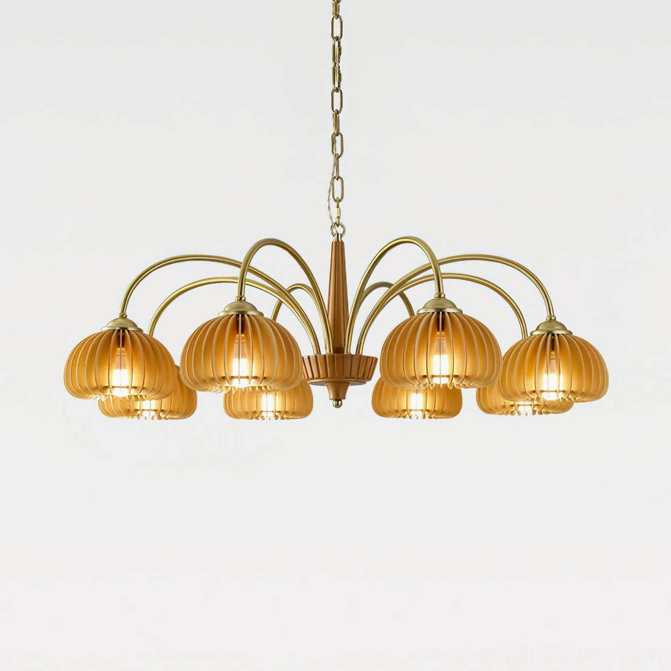 Overhead view of multi-arm pumpkin chandelier showing symmetrical ribbed glass shade arrangement