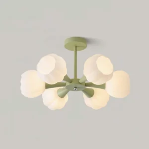 Modern pumpkin floral pendant light with green metal frame and white glass shades, front studio photography