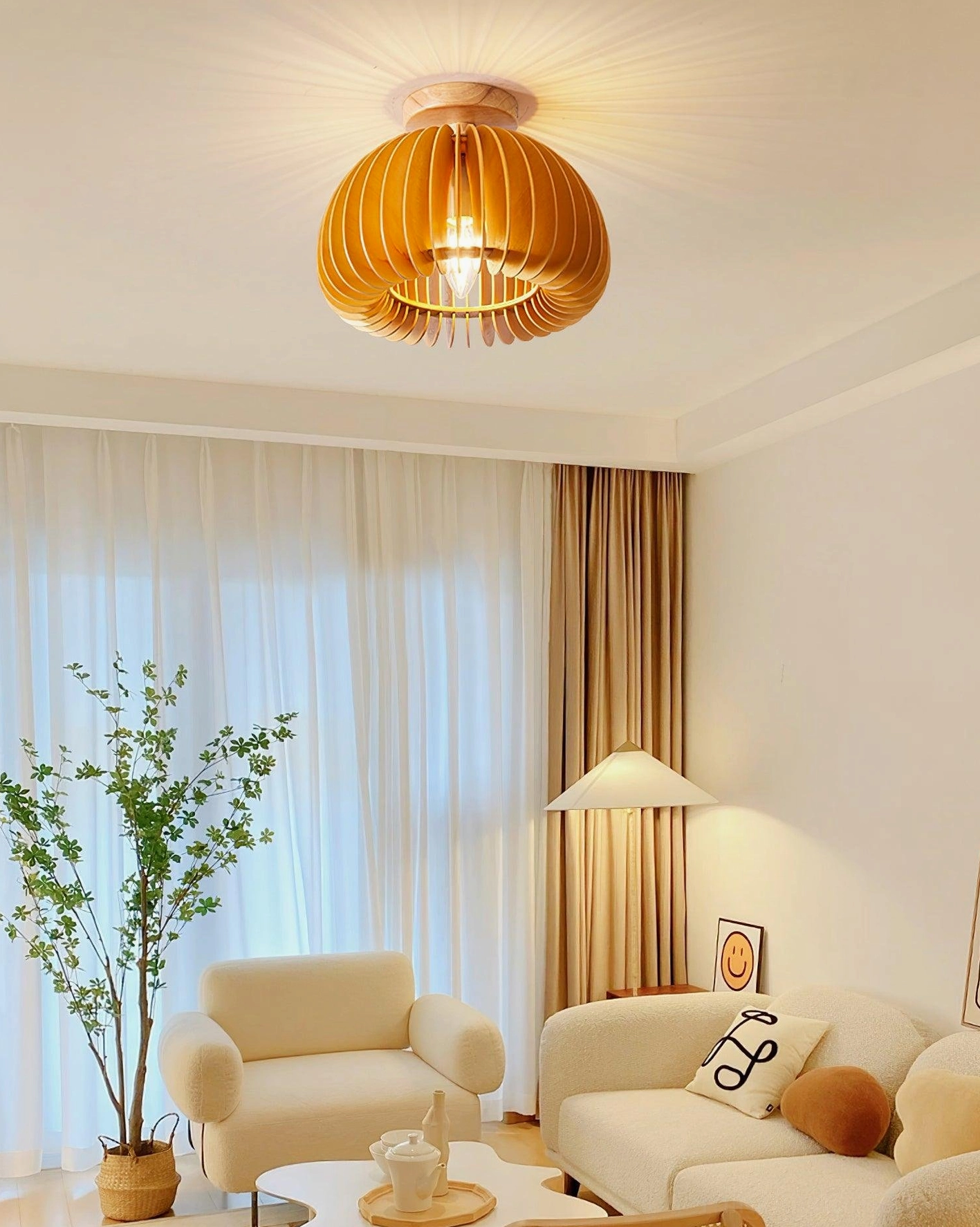 Contemporary living room with pumpkin wood ceiling light fixture providing cozy atmosphere