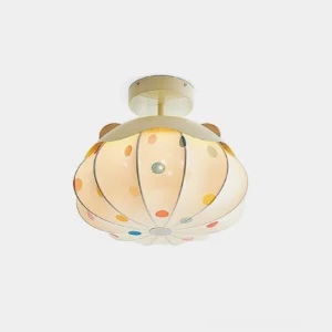 Pumpkin polka dot kids ceiling lamp with cream finish and adorable ear accents in studio lighting