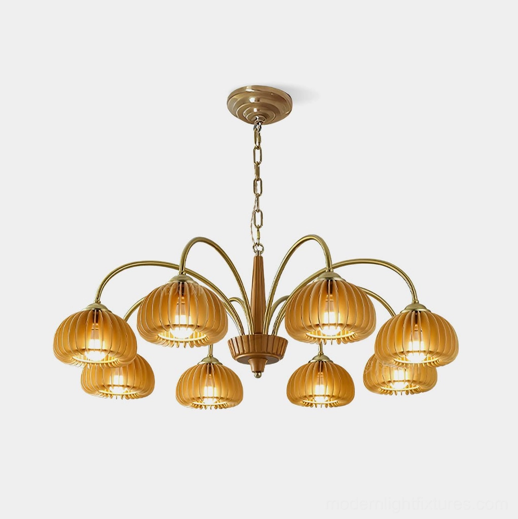 Pumpkin ribbed glass chandelier with copper brass frame and golden amber shades in studio front view