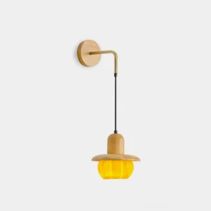 Pumpkin wood wall sconce front view with warm amber light diffusion, Nordic minimalist design studio photography