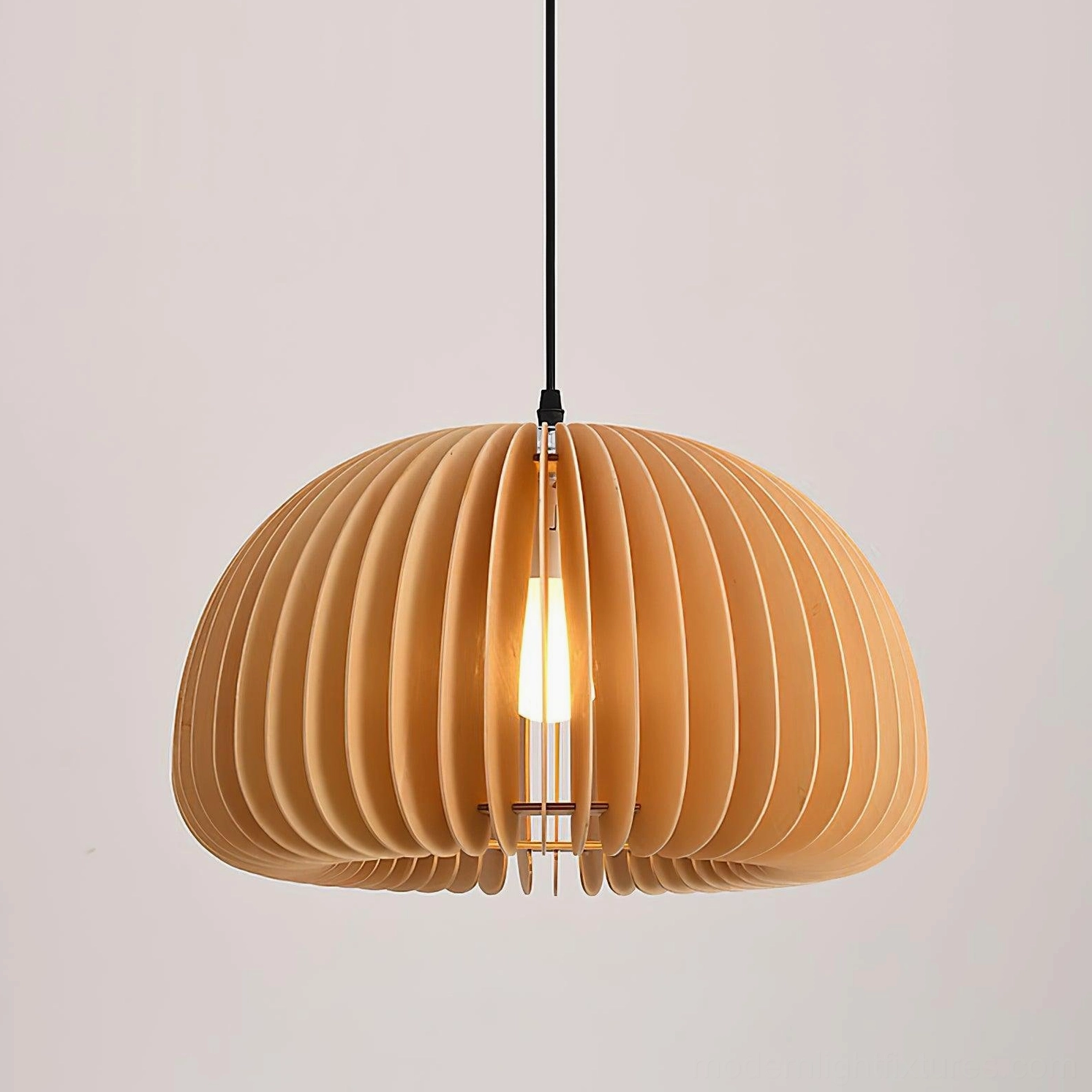 Wood pumpkin pendant lamp installation showing suspension wire and mounting configuration