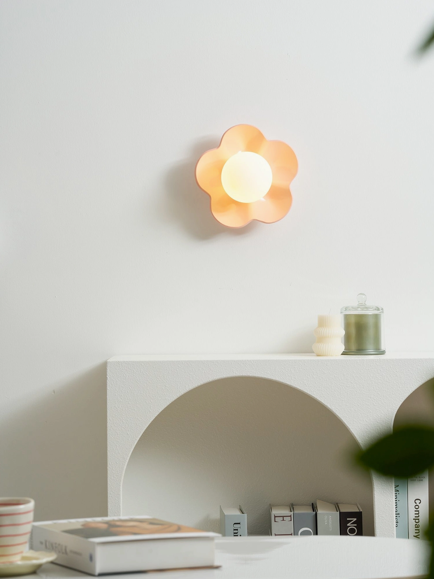 Purple Fleur wall sconce reading light bedside installation - theatrical flower lamp intimate bedroom illumination