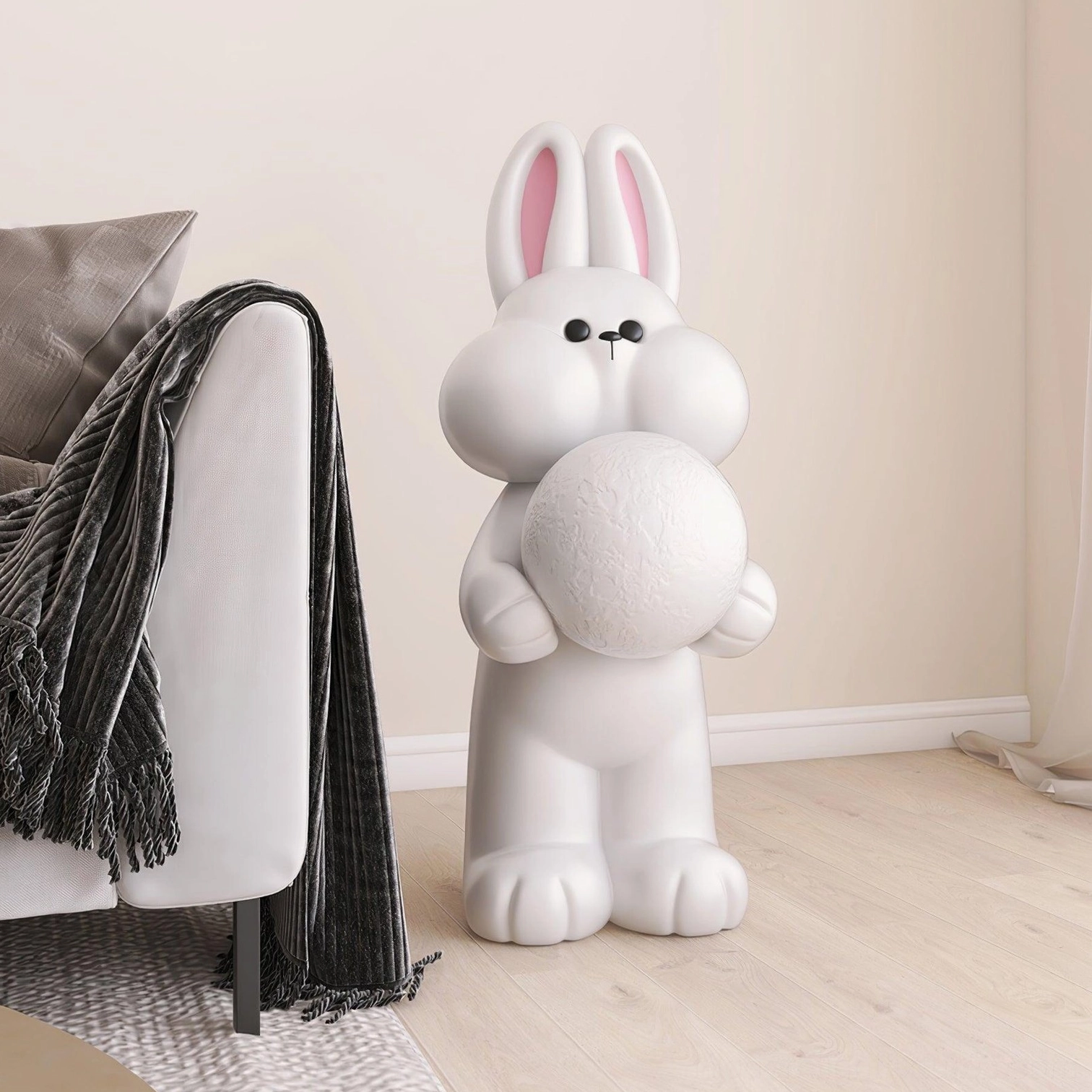 Adorable rabbit sculpture floor lamp creating warm ambient mood lighting in modern living space