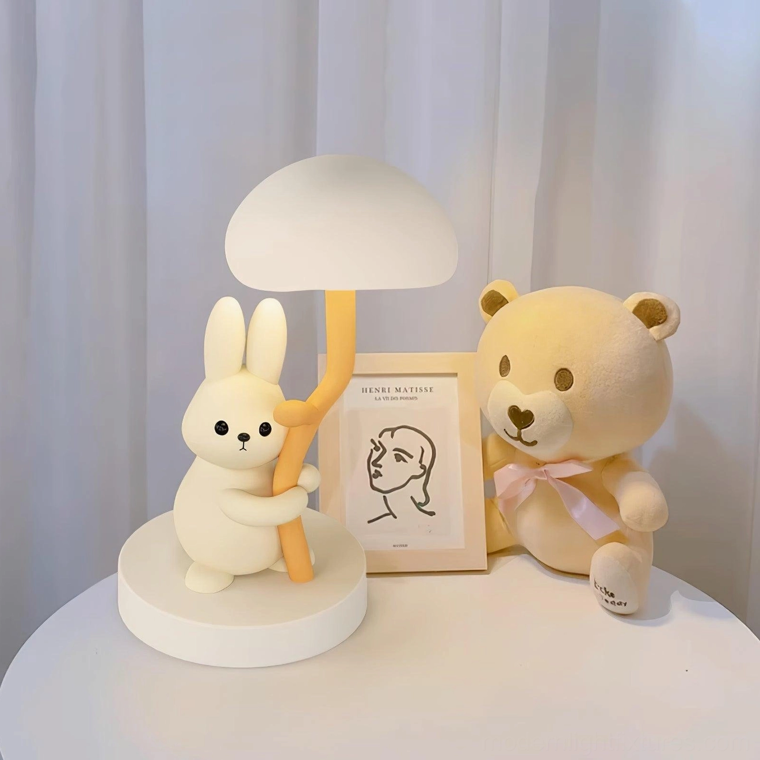 Rabbit hug table lamp size comparison with desktop items for scale reference