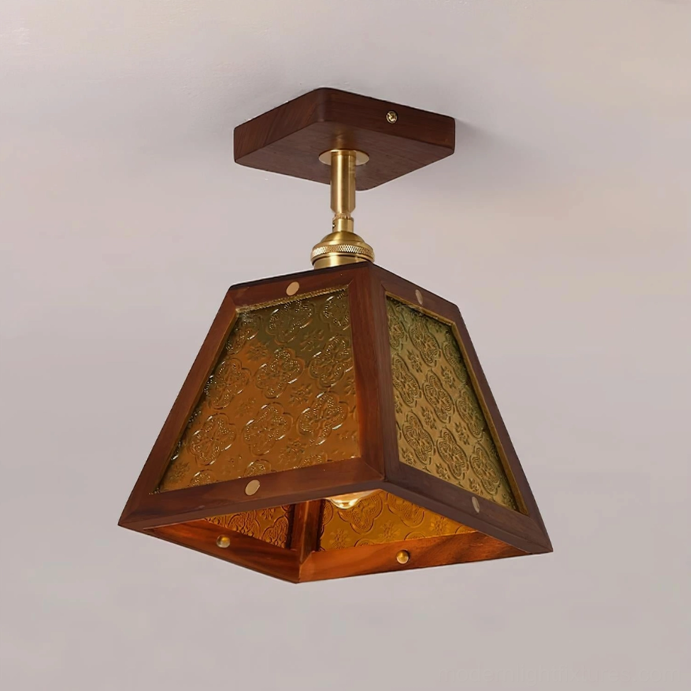 Radia amber stained glass ceiling fixture with dark walnut wood frame and brass hardware detail