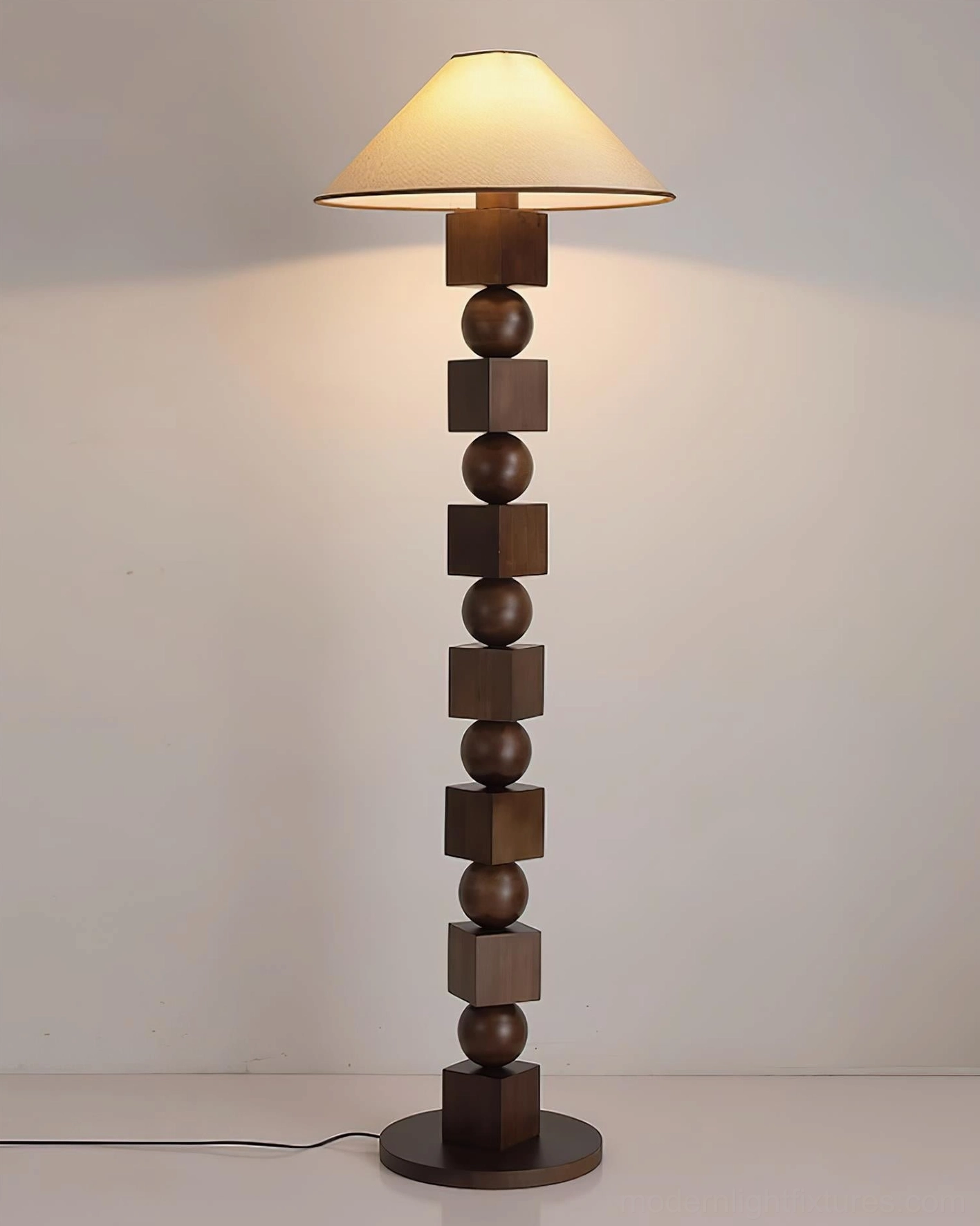 Wooden floor lamp with conical fabric shade design detail highlighting light diffusion and warm ambient glow characteristics