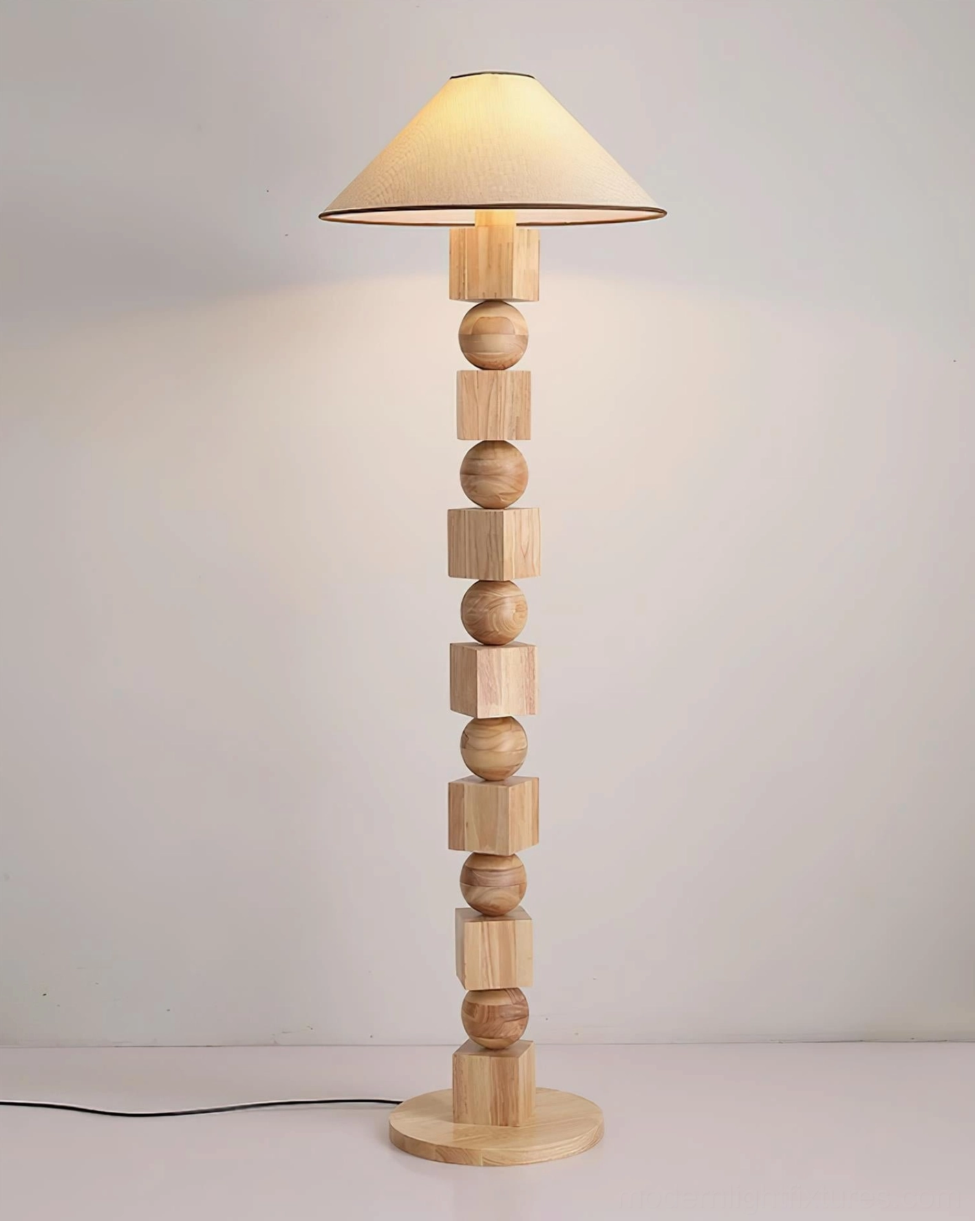 Natural or walnut finish Radian wooden floor lamp positioned as focal point accent piece in minimalist living space