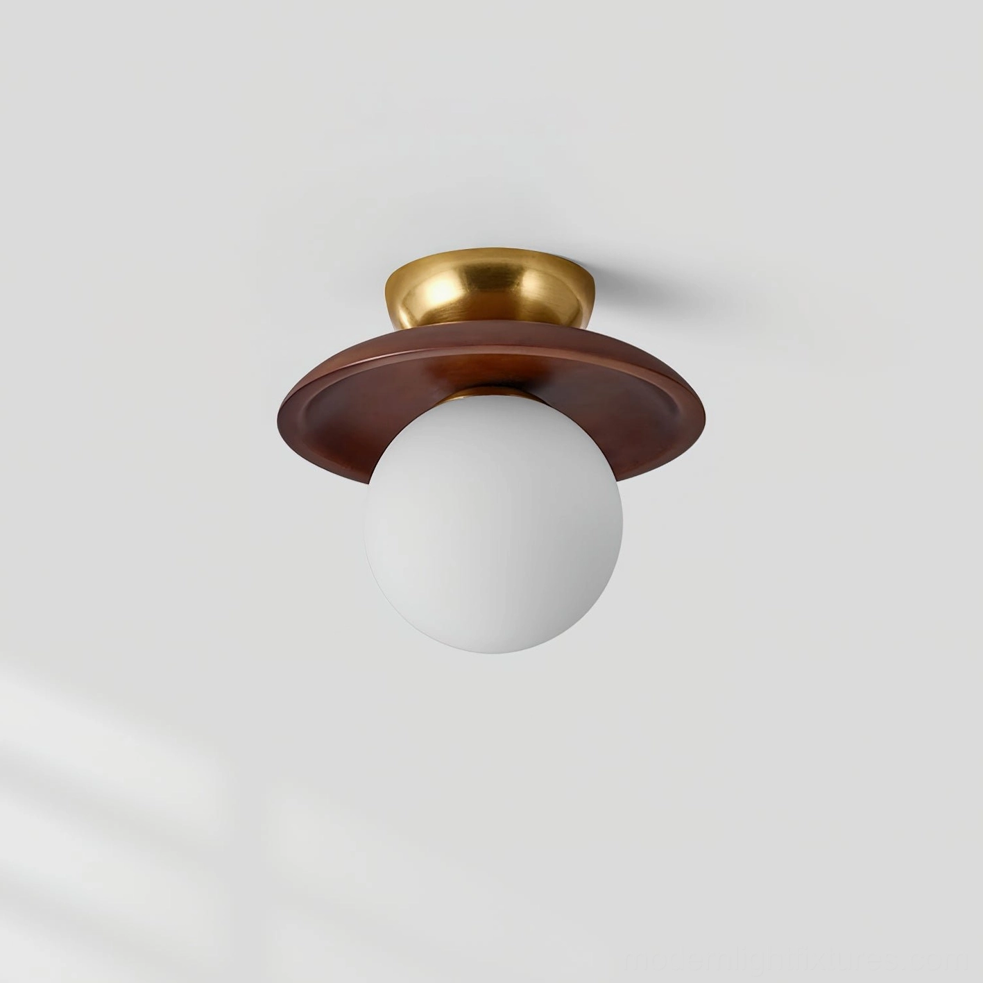 Close-up detail of Radiora semi-flush ceiling fixture showing frosted white glass globe and metal canopy construction