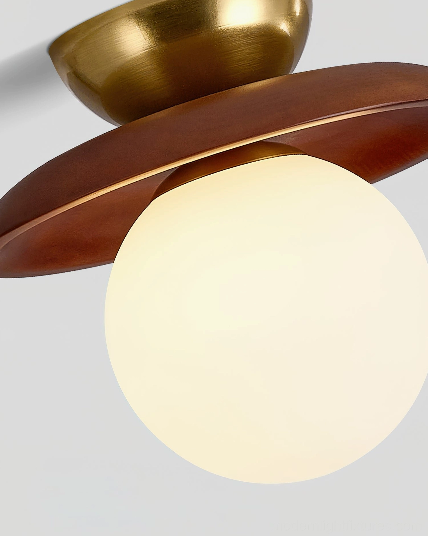 Complete Radiora mid-century modern ceiling fixture with warm brass finish and frosted opal glass globe