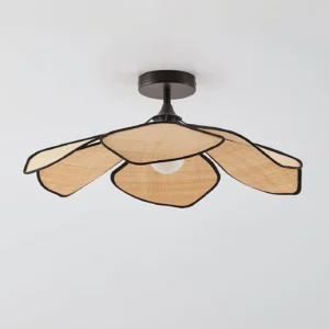 Natural beige raffia petal ceiling light with black metal hardware and frame, angled front view showcasing woven texture and construction details