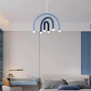 Rainbow arc pendant lamp installed in contemporary bedroom above study desk with modern decor