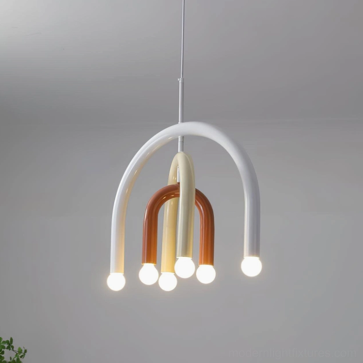 Rainbow arc pendant light sloped ceiling adaptable installation feature showcase