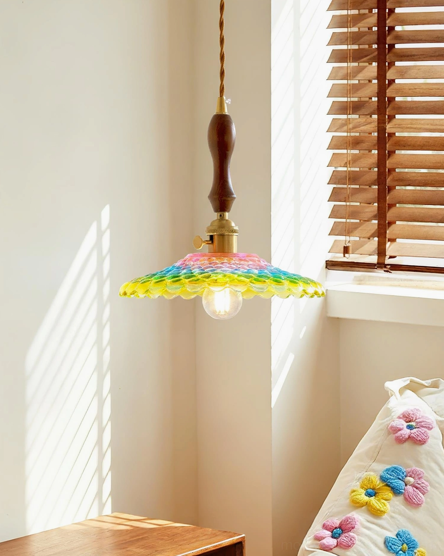 Rainbowa pendant light installed in rustic bedroom with window blinds creating ambient illumination