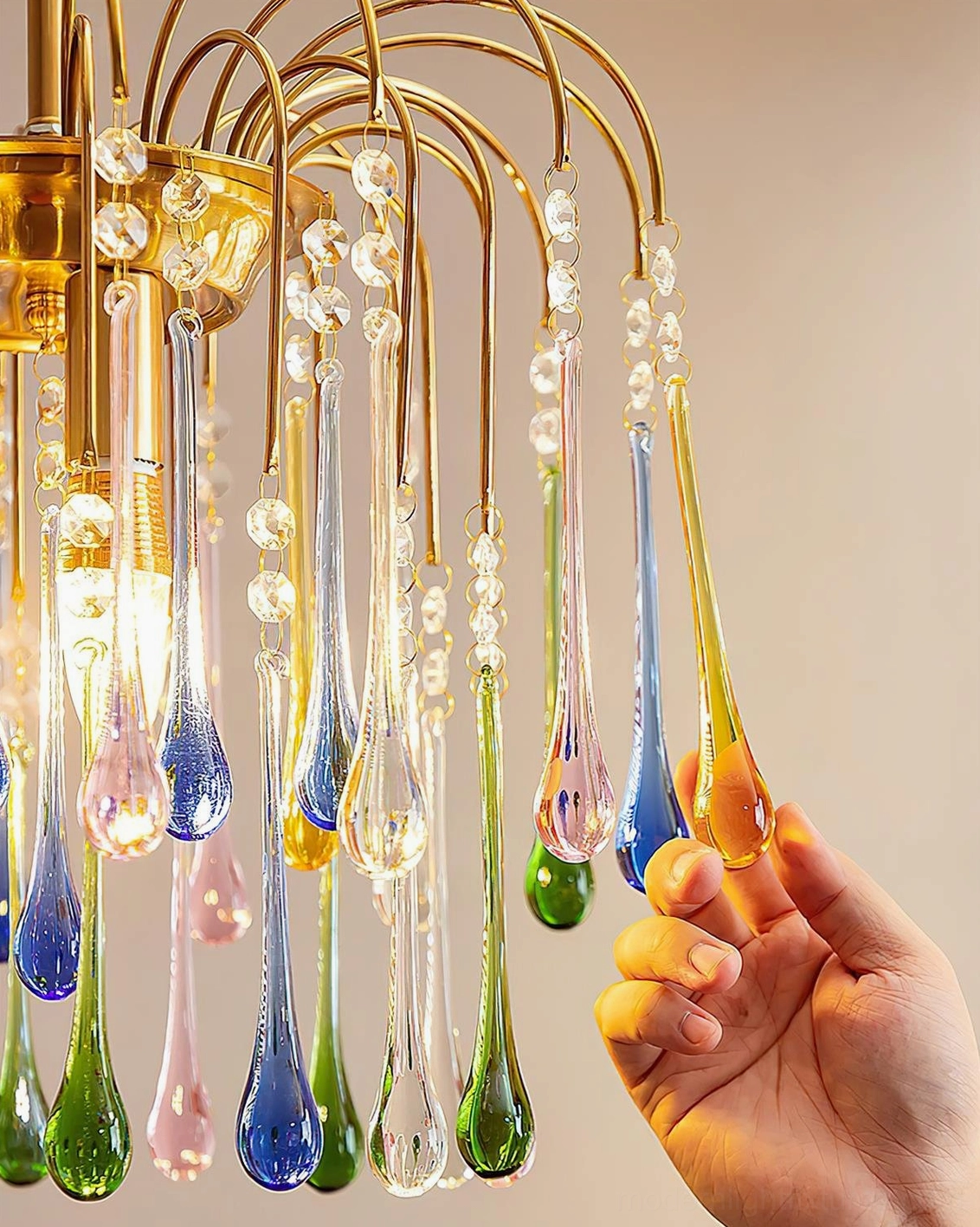 Rainlight crystal teardrop chandelier studio lighting showcase with white background and professional photography