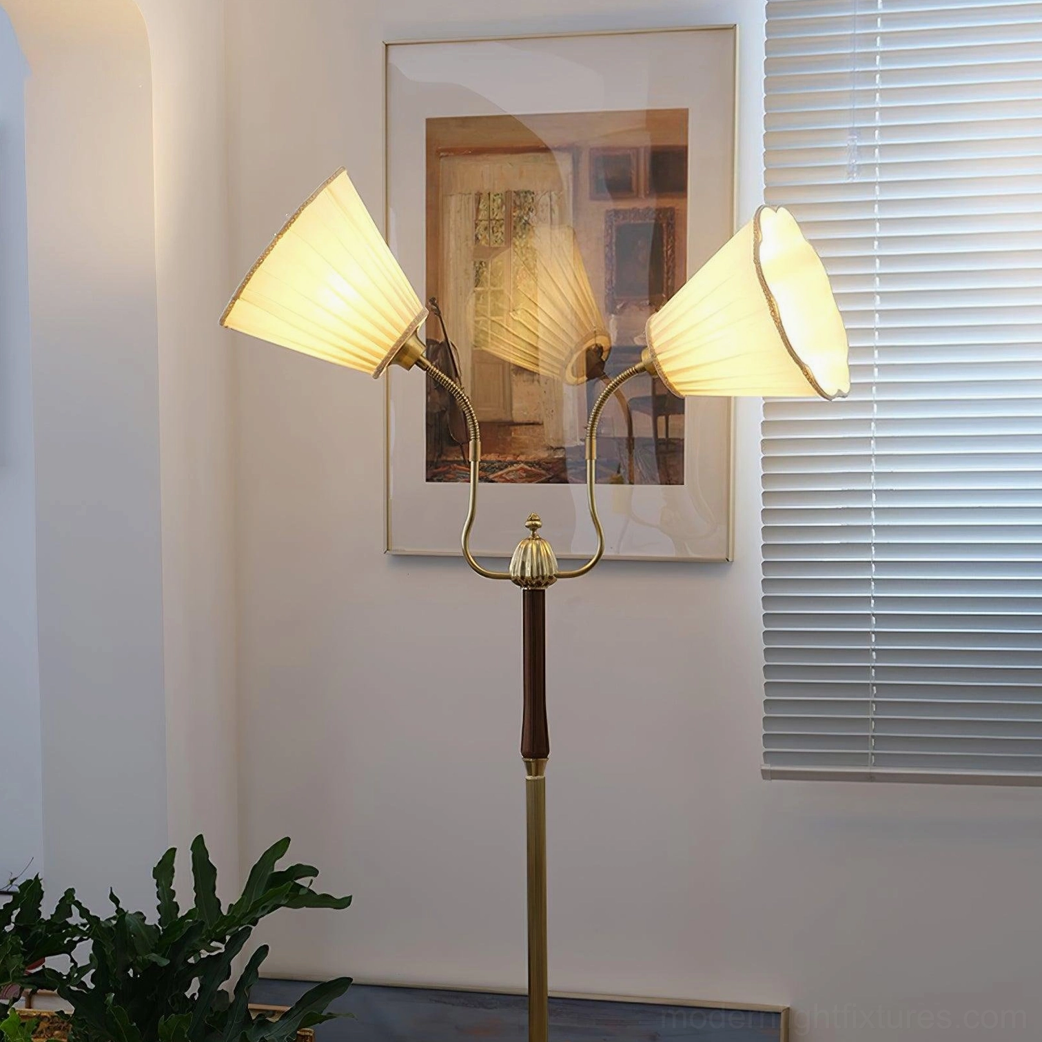 Ramira brass pole floor lamp with walnut wood accents showing material quality and handcrafted construction