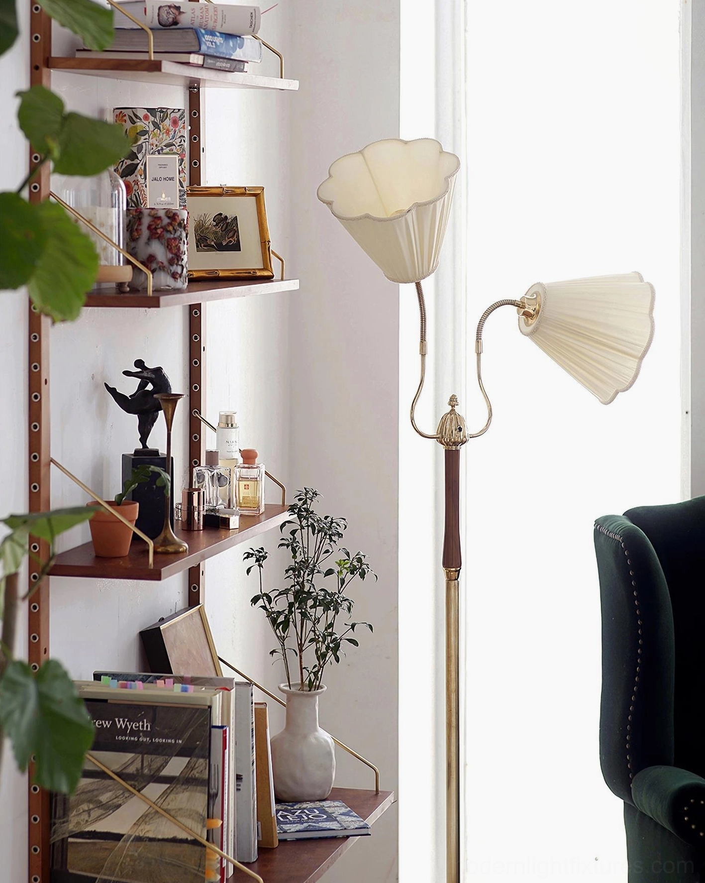 Ramira brass and wood floor lamp providing task lighting in home office study with wall shelving and warm ambiance