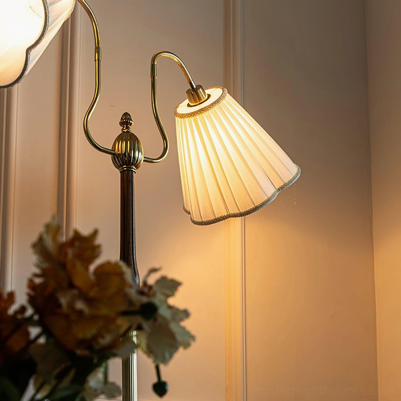Ramira mid-century modern floor lamp with dual pleated fabric shades casting soft directional light