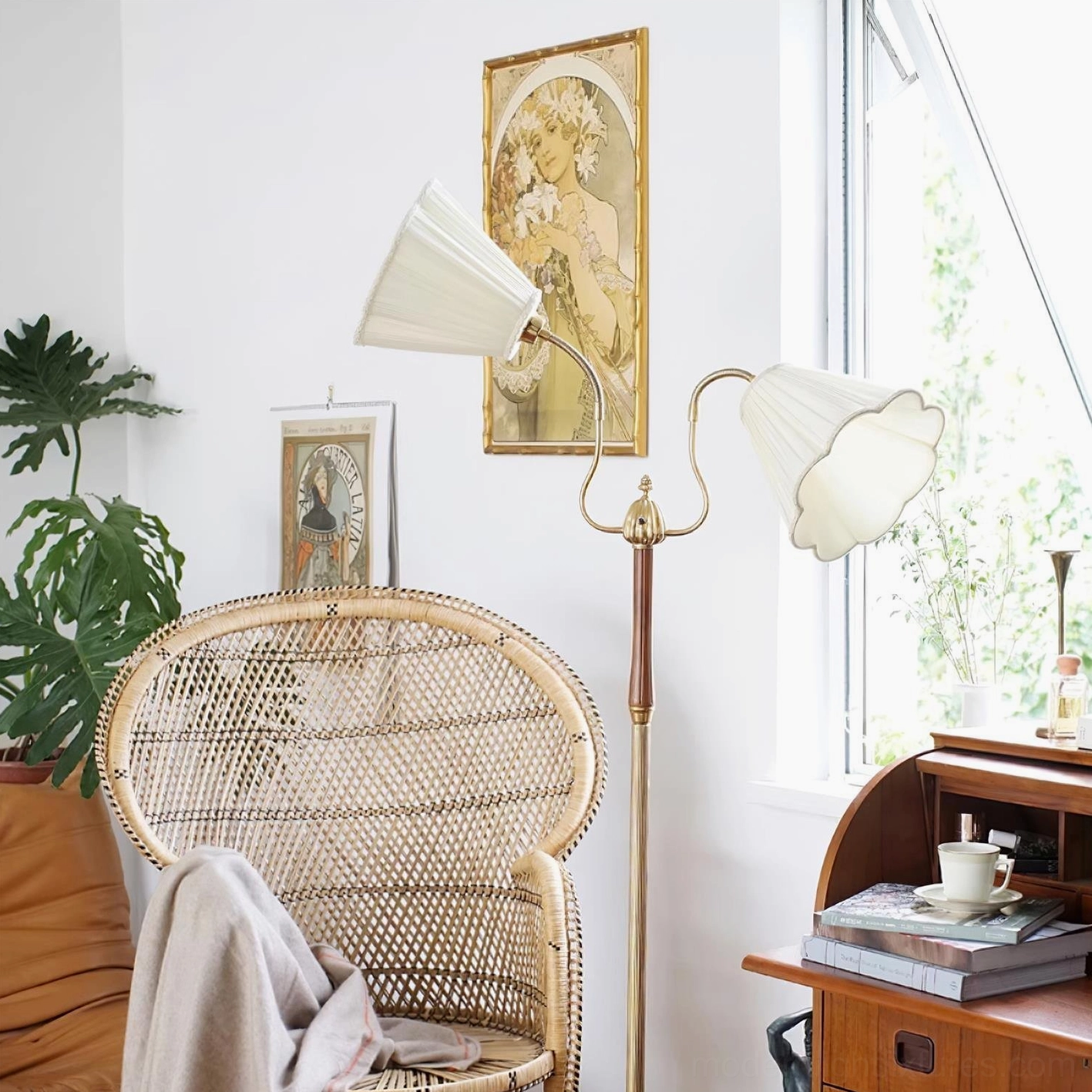 Ramira vintage floor lamp illuminated in bohemian living room setting with warm glowing light, brass and wood construction visible