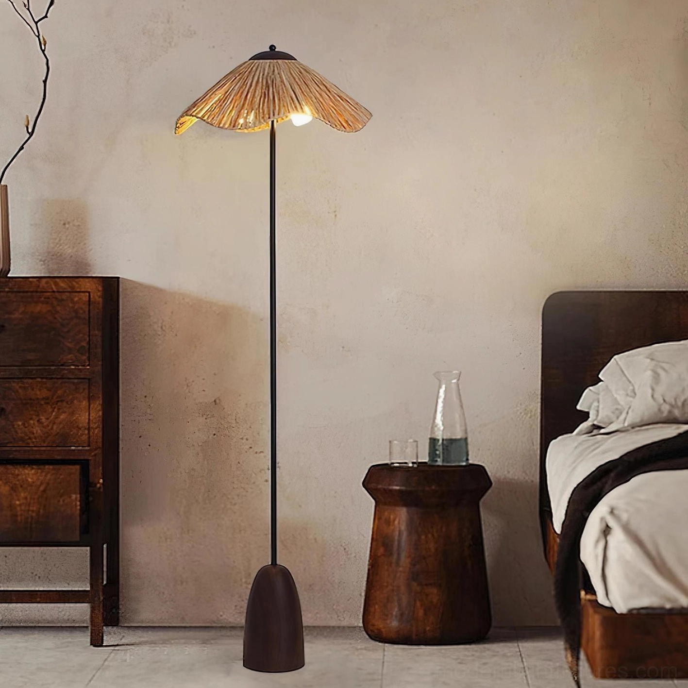 Rania woven floor lamp in wabi-sabi bedroom setting, warm ambient lighting beside vintage wooden furniture
