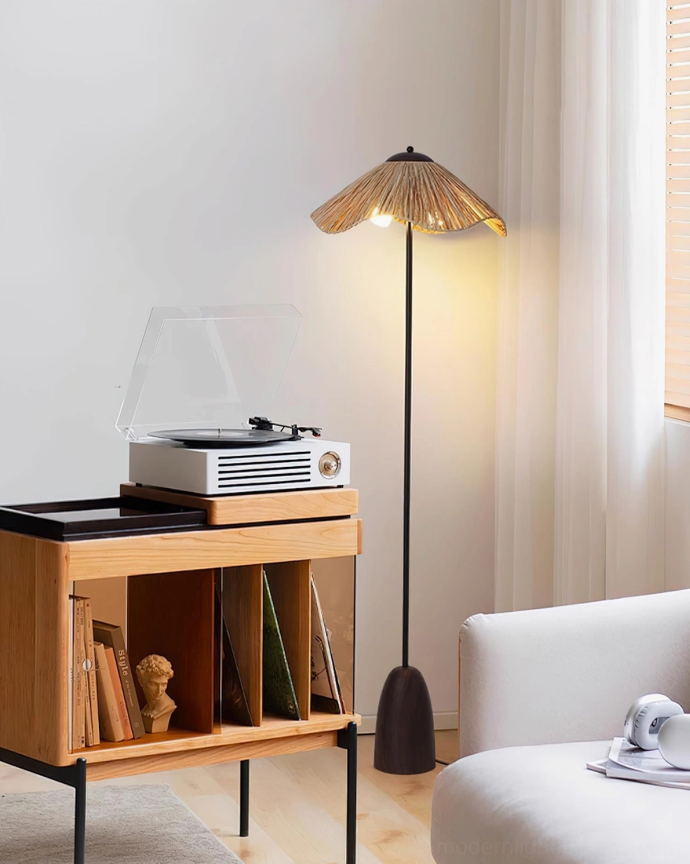 Rania woven shade floor lamp in Nordic living room corner with vinyl record cabinet and minimalist furniture