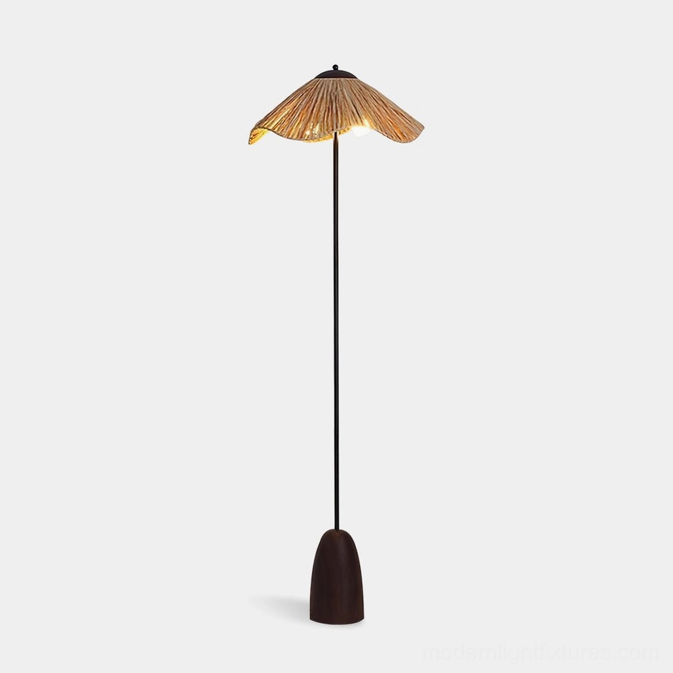 Rania natural raffia floor lamp with black metal stem and wooden base, front product view on white background