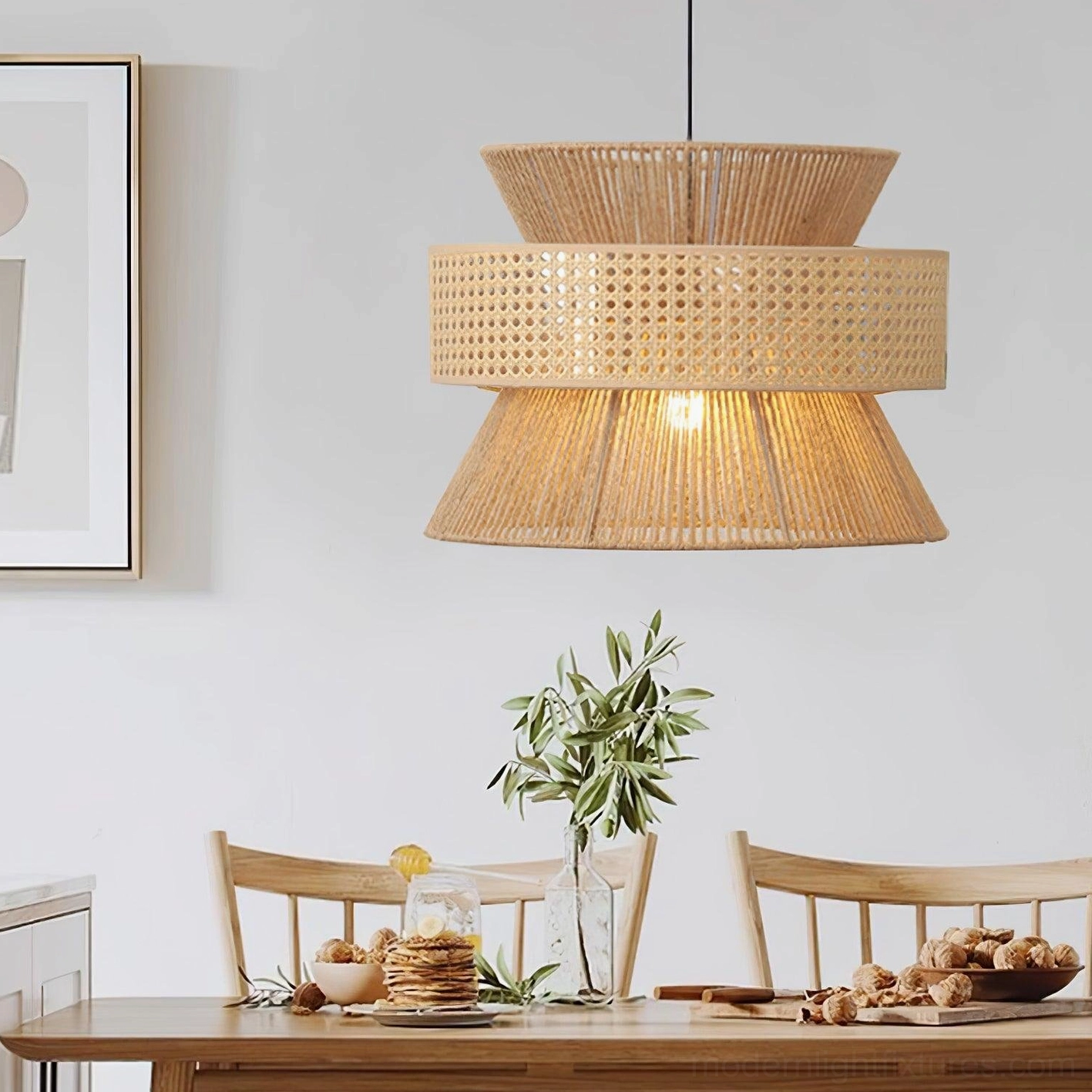 Single rattan pendant lamp with three-tier shade in japandi minimalist dining space