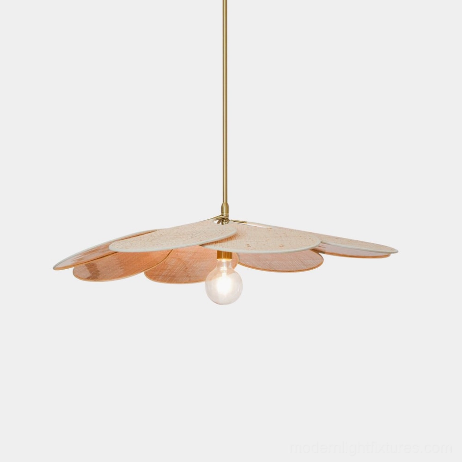 Rattan bloom pendant light with layered woven petal design and gold suspension rod, studio frontal view