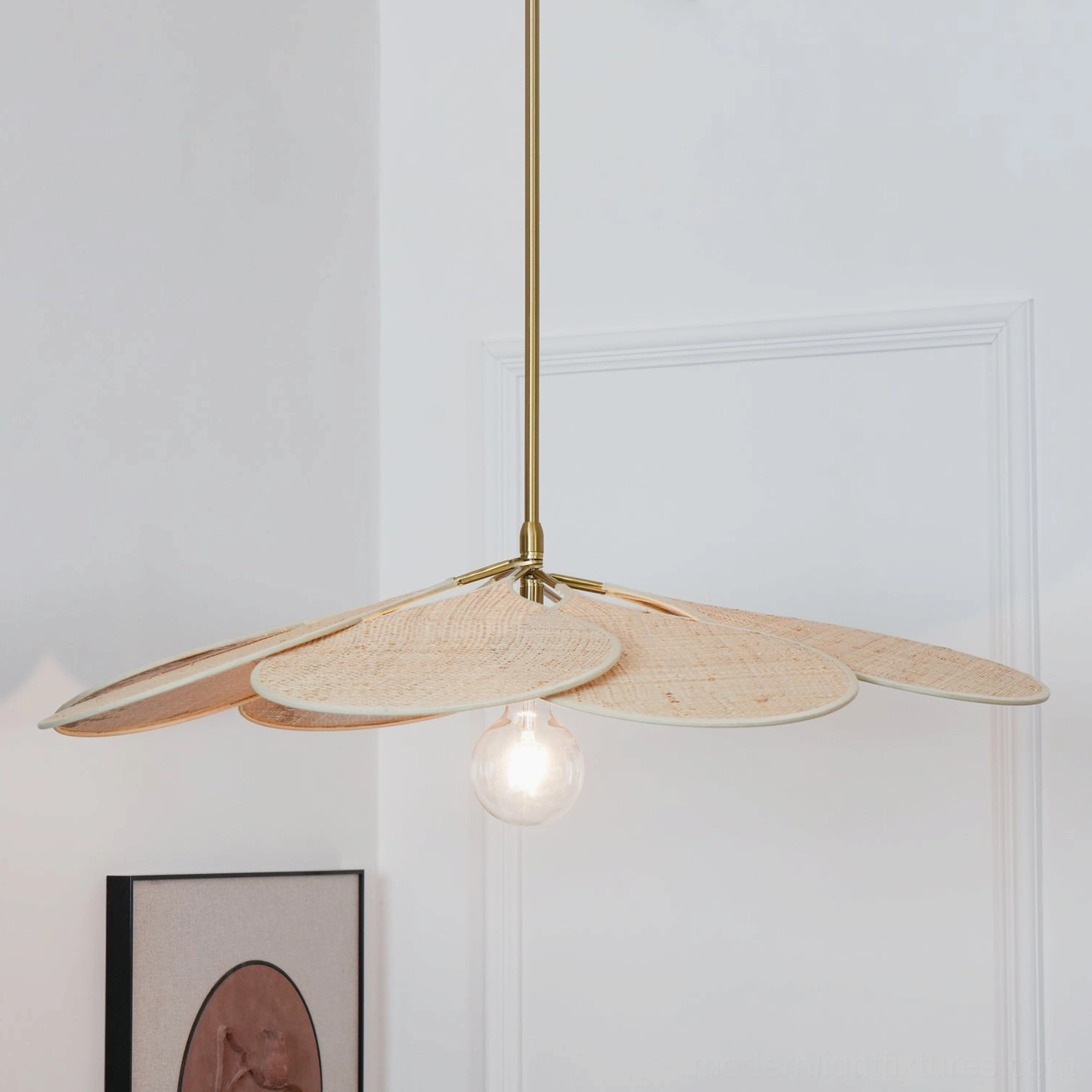 Rattan bloom pendant fixture detail showing layered petal construction and gold metal hardware