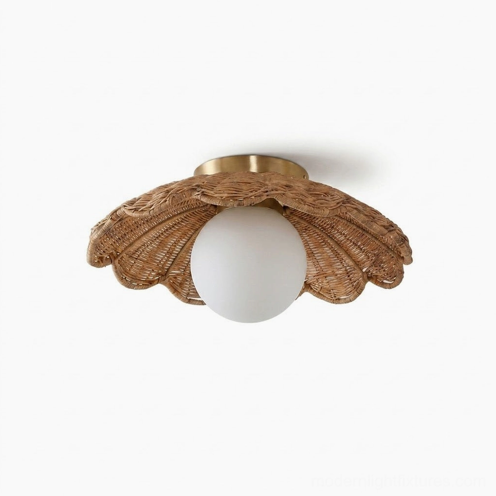 Handwoven dark rattan scallop ceiling fixture with antique brass canopy - angled studio view