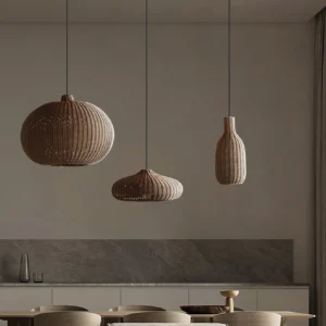 Rattan pendant lamp hanging above modern minimalist dining table in contemporary interior