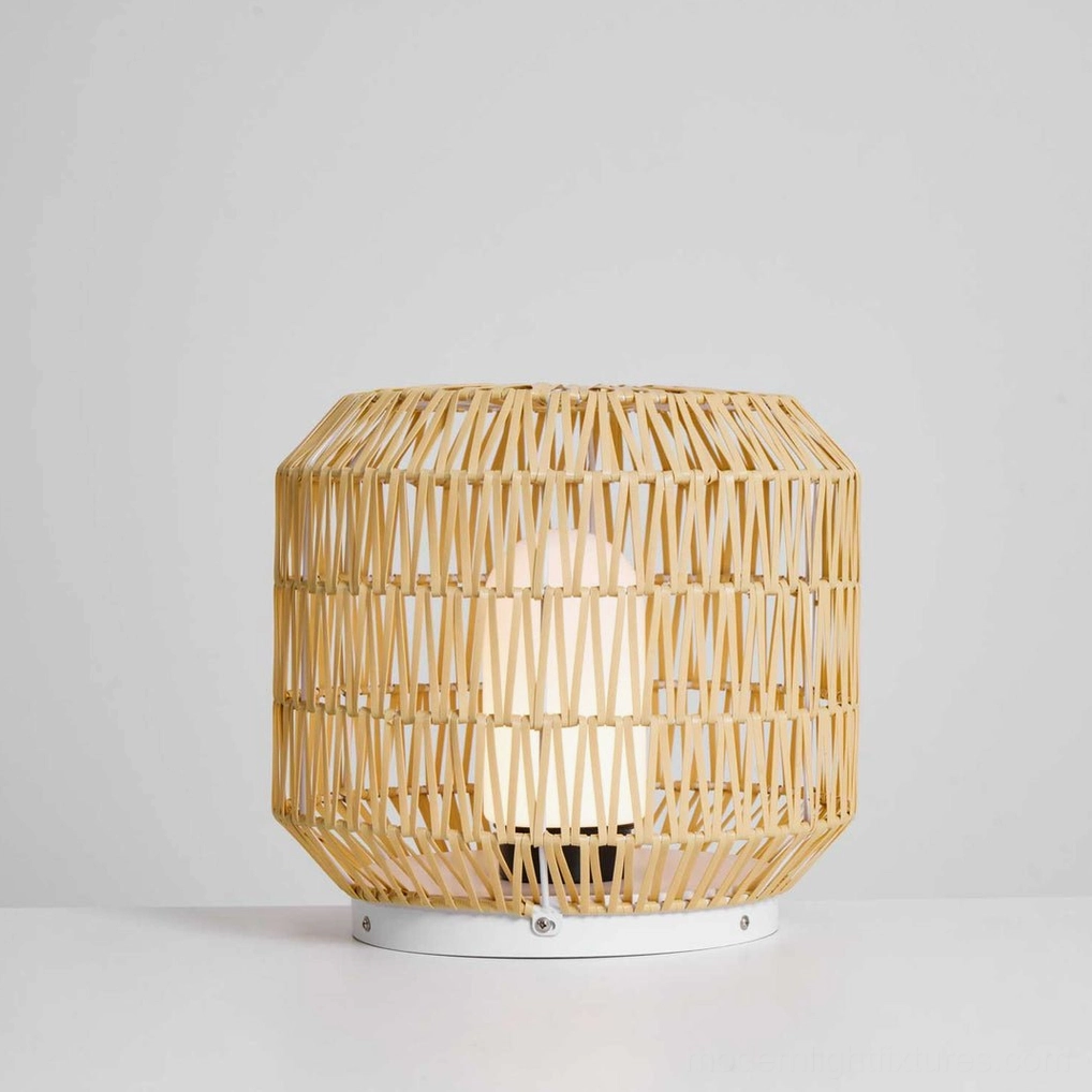 Rattan outdoor lamp in Mediterranean courtyard setting complementing rustic stone features