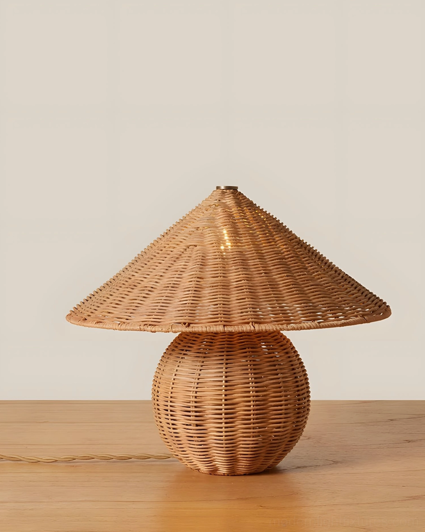 Hand-woven rattan mushroom table lamp front studio view, smooth woven surface detail with warm light brown natural tone and metal base