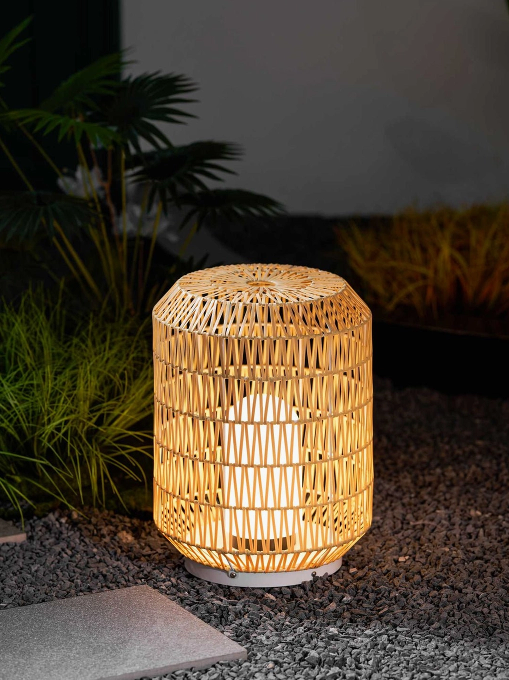 Woven rattan outdoor lamp showing IP20 weather rating suitable for outdoor use