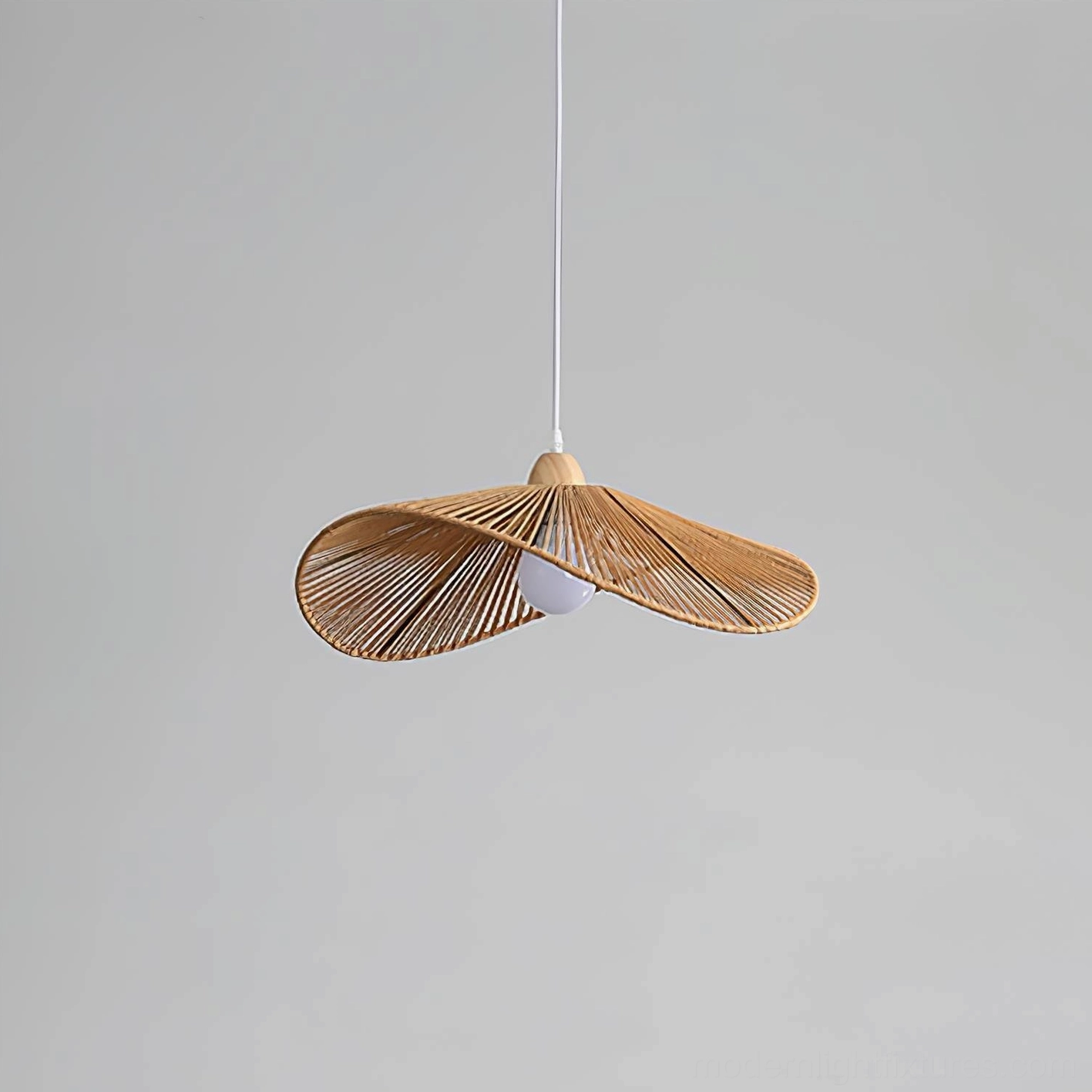 Rattan pendant ceiling light fixture installation view in modern minimalist dining space