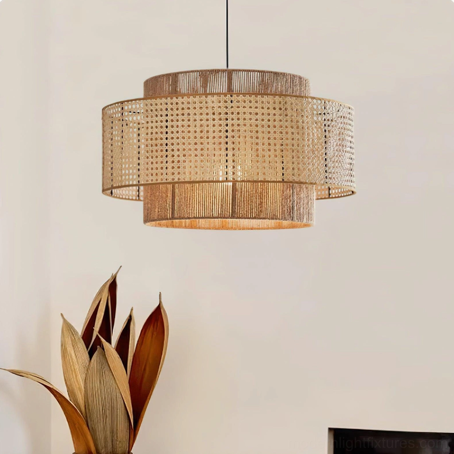 Rattan pendant fixture with warm light glowing through woven pattern, creating shadow effects and ambient atmosphere in living space