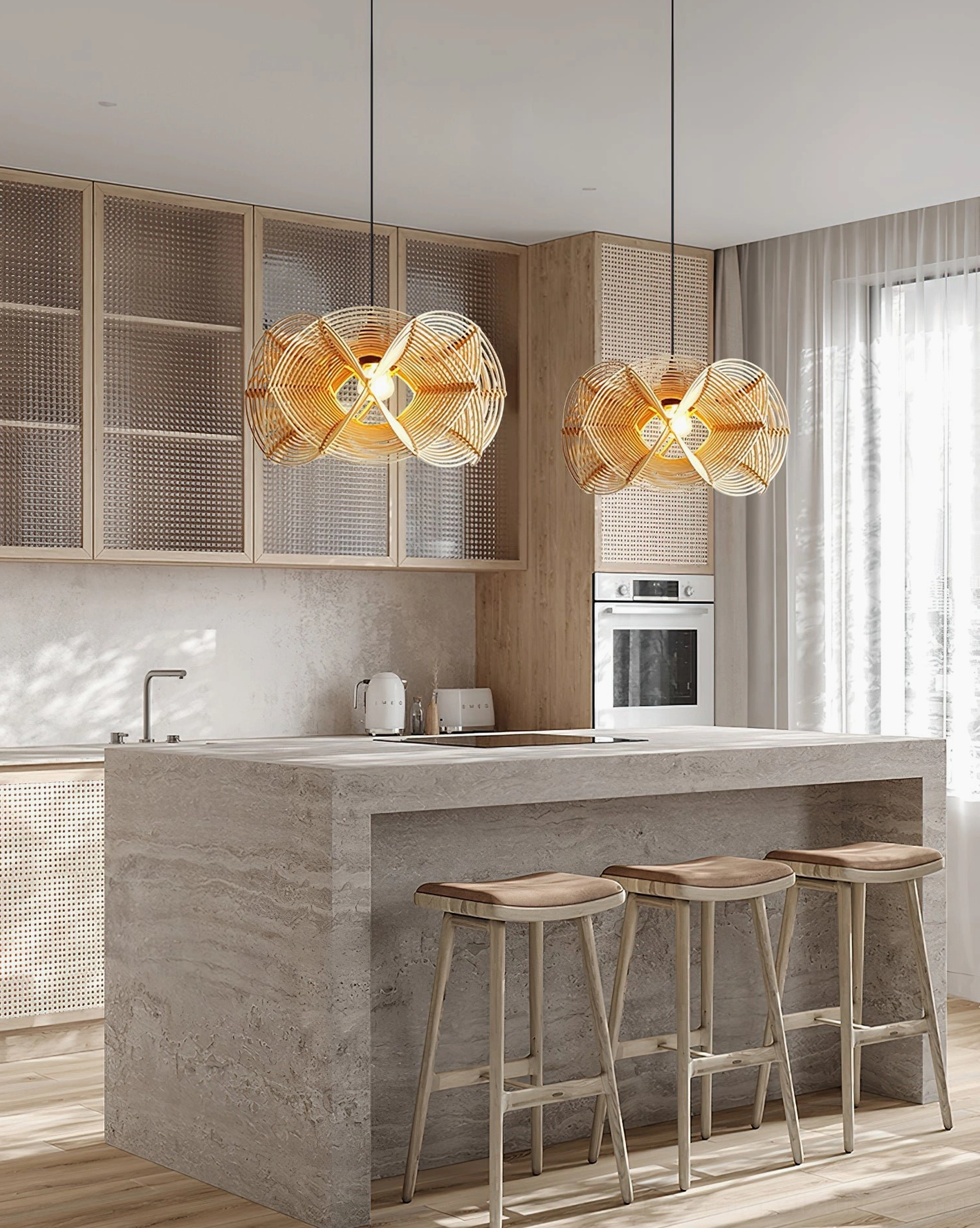 Two rattan pendant fixtures illuminating contemporary kitchen island with concrete countertop and wooden cabinetry