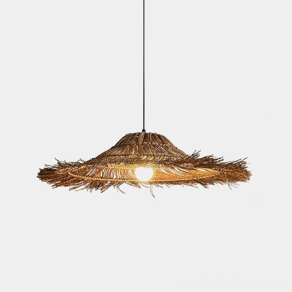 Natural rattan handwoven pendant light with umbrella-shaped shade, front view showing warm brown woven texture and dappled light diffusion