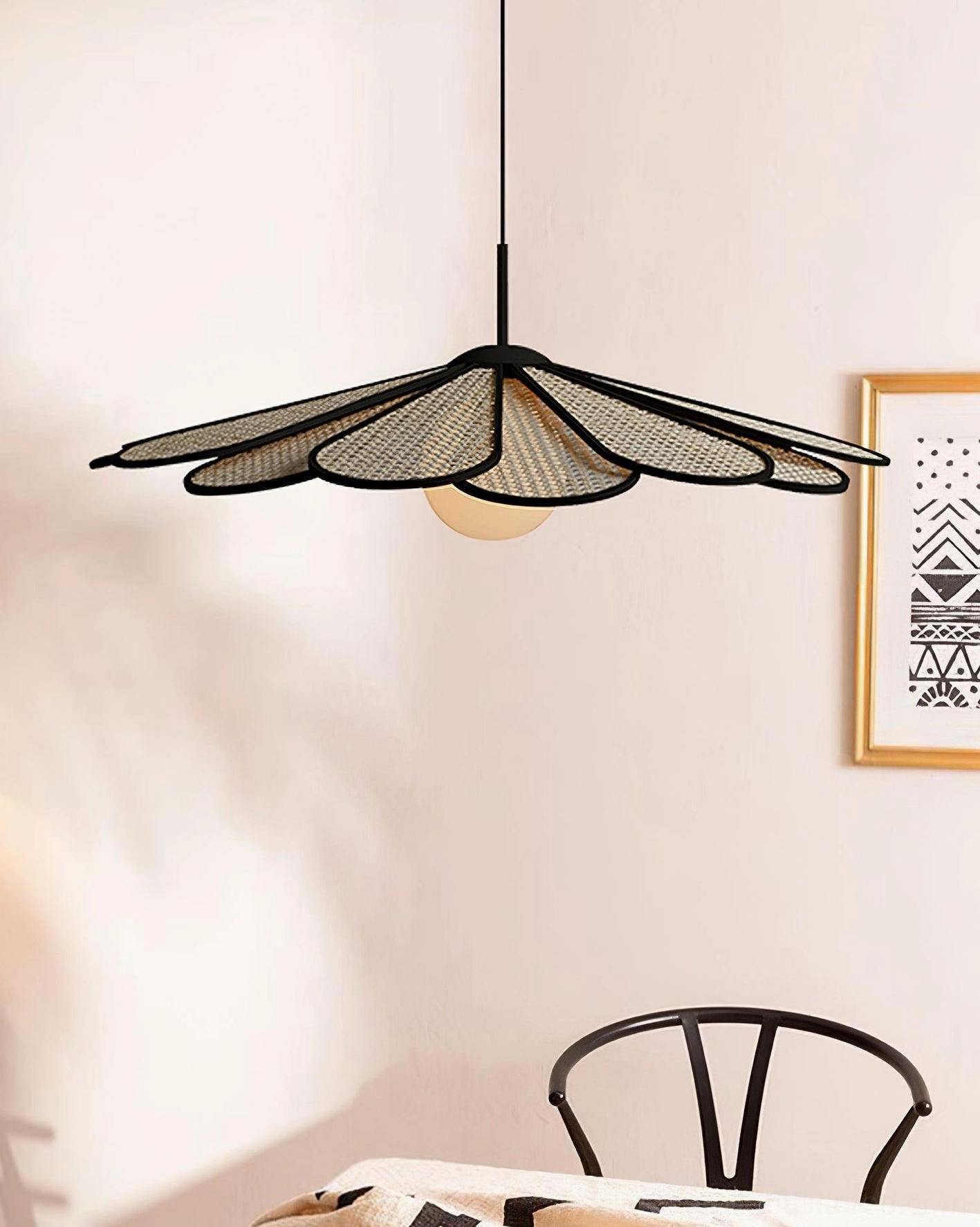Tropicana pendant light hanging in warm bohemian dining room with wooden furniture and natural lighting