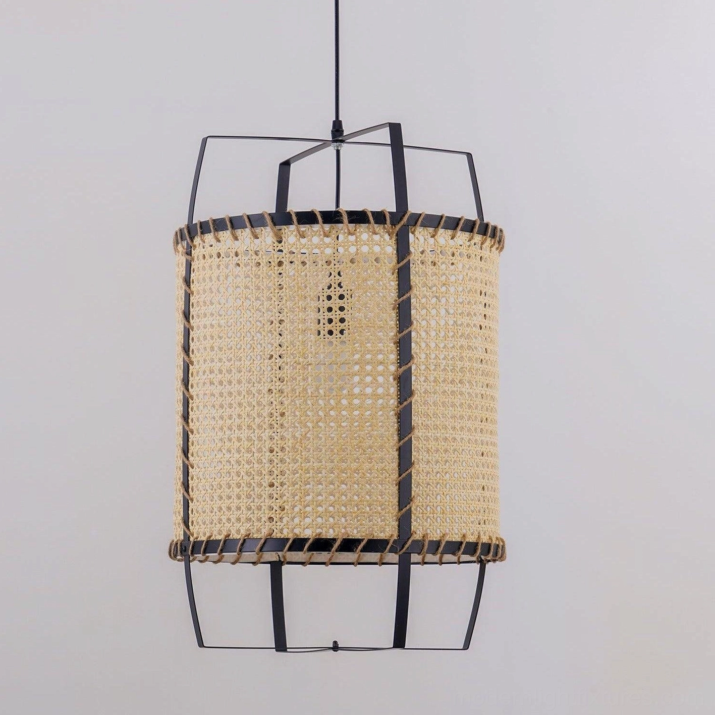 Rattan pendant light with natural bamboo and black metal finish options