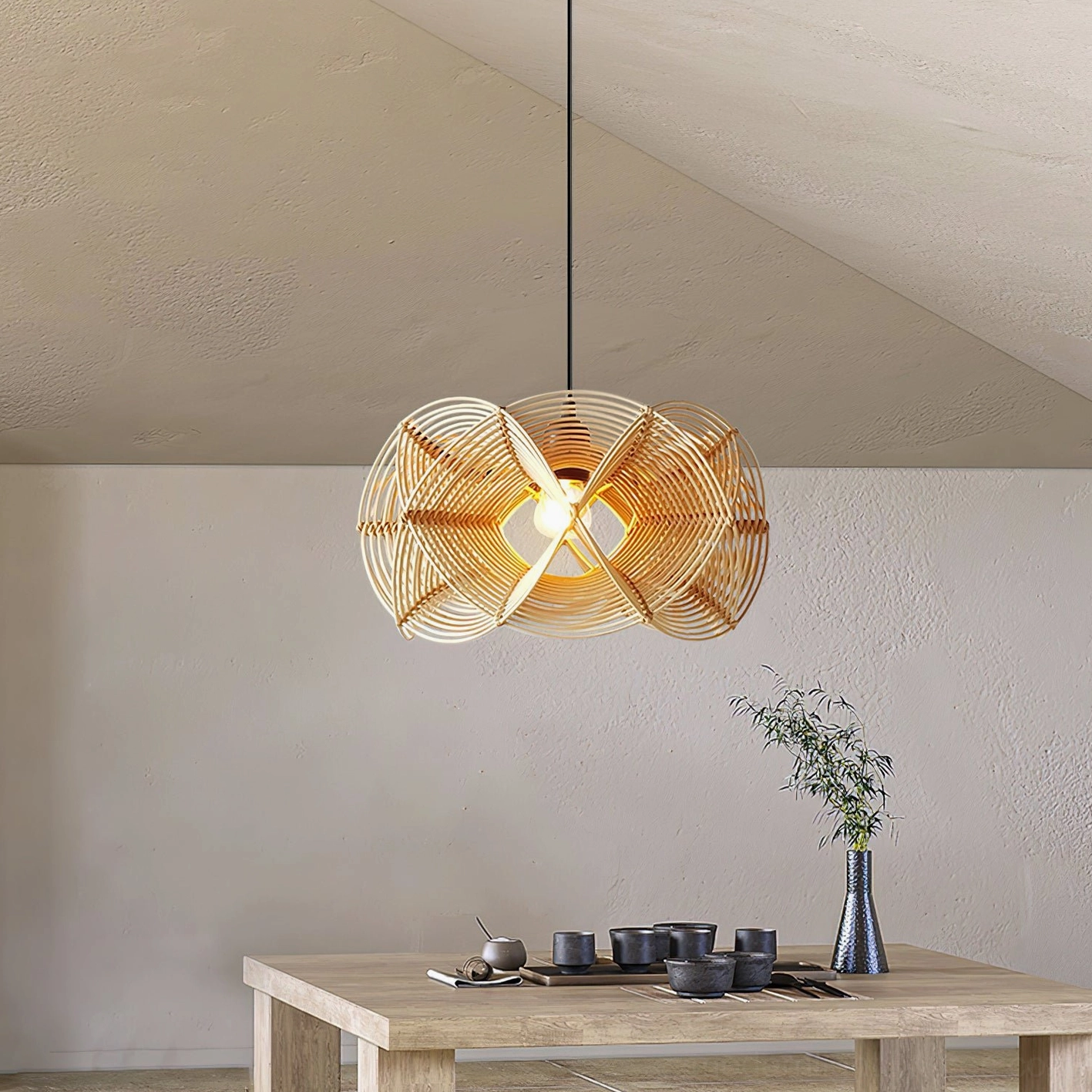 Overhead view of rattan pendant lamp showing detailed weave structure and exposed E26 E27 bulb socket in minimalist dining setting