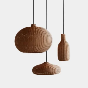 Collection of rattan woven pendant lights in natural brown and light brown finishes displayed on white background