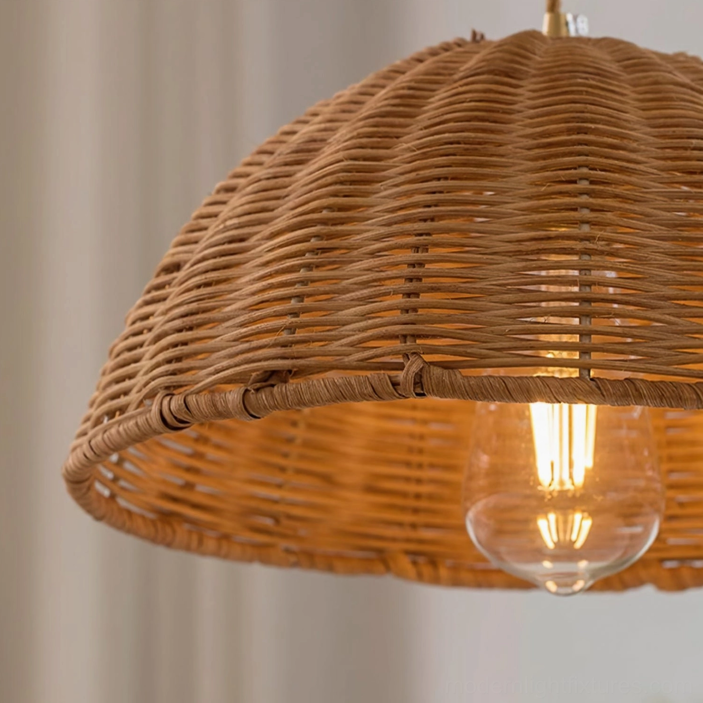 Rattan pendant fixture with metal frame showing structural construction and craftsmanship details