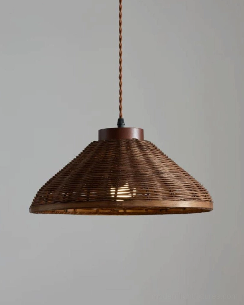 Handwoven rattan pendant light showing natural weave pattern detail and warm light diffusion through rattan