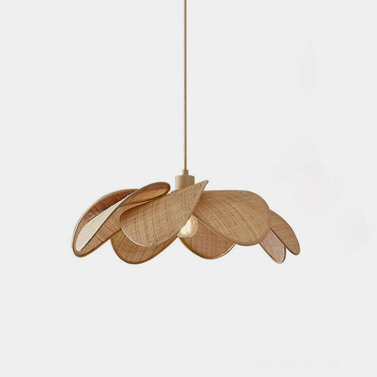 Handwoven rattan petal pendant light with layered natural brown woven shade and gold metal hardware, frontal studio view