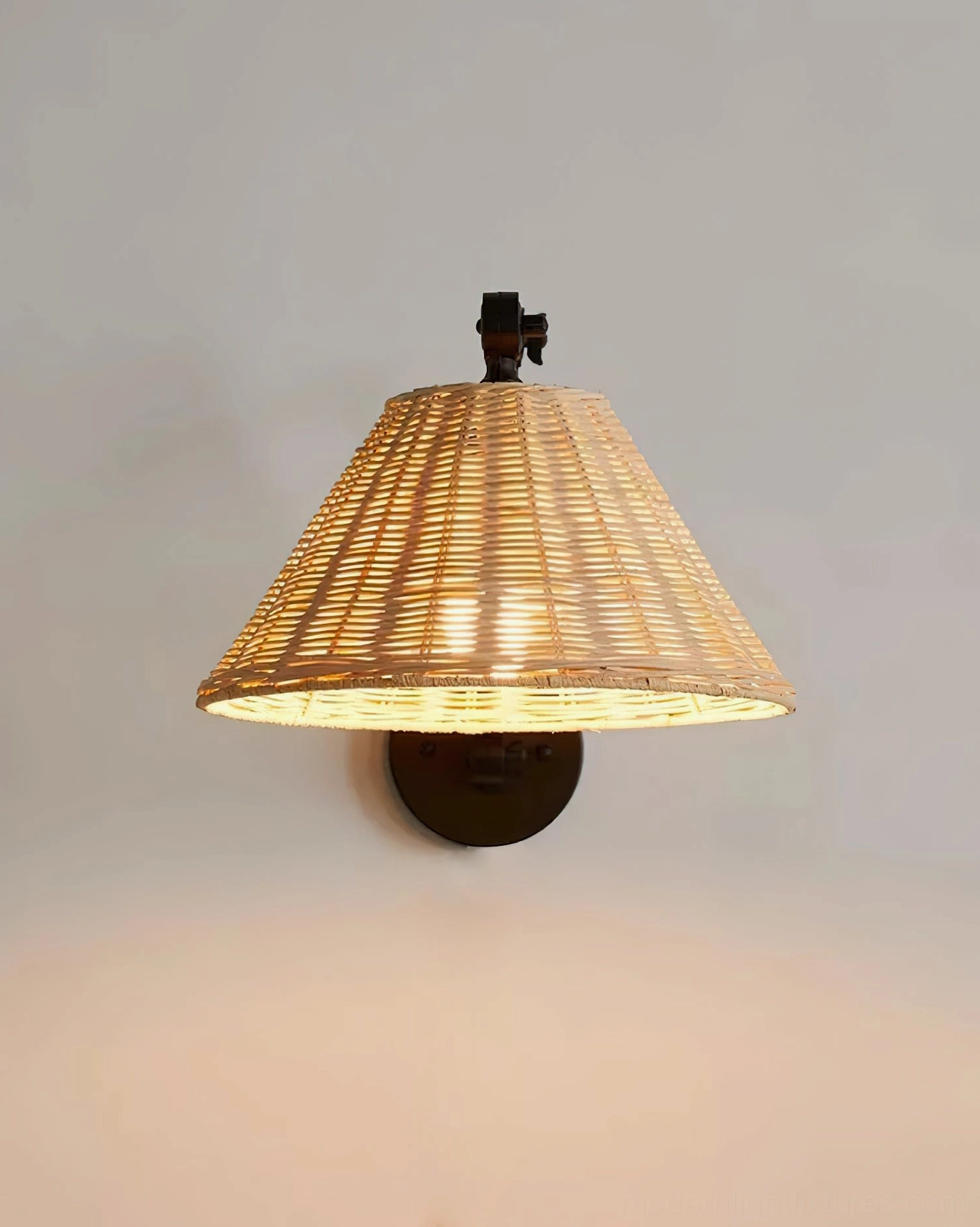 Adjustable rattan swing arm wall lamp creating warm directional light for reading or task lighting