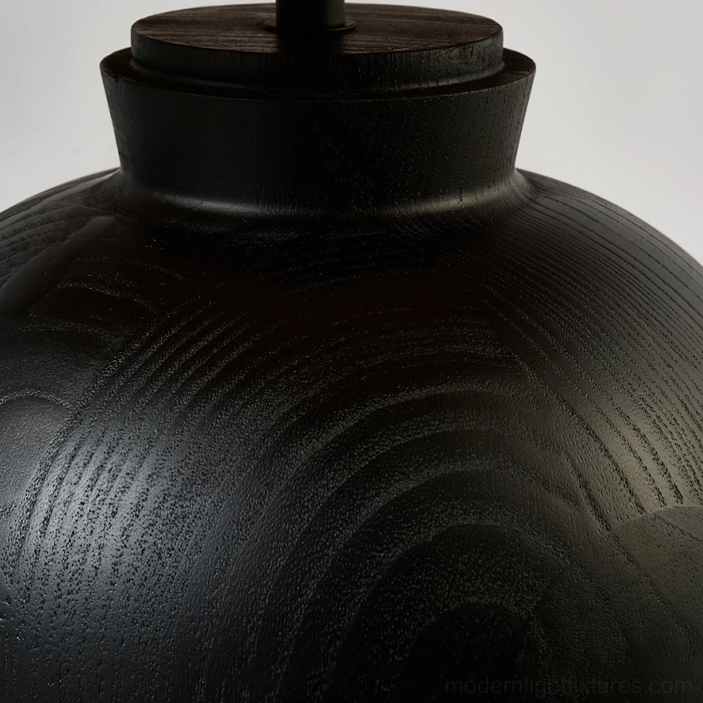 Hand-woven rattan table lamp as decorative statement piece with natural materials and modern aesthetics