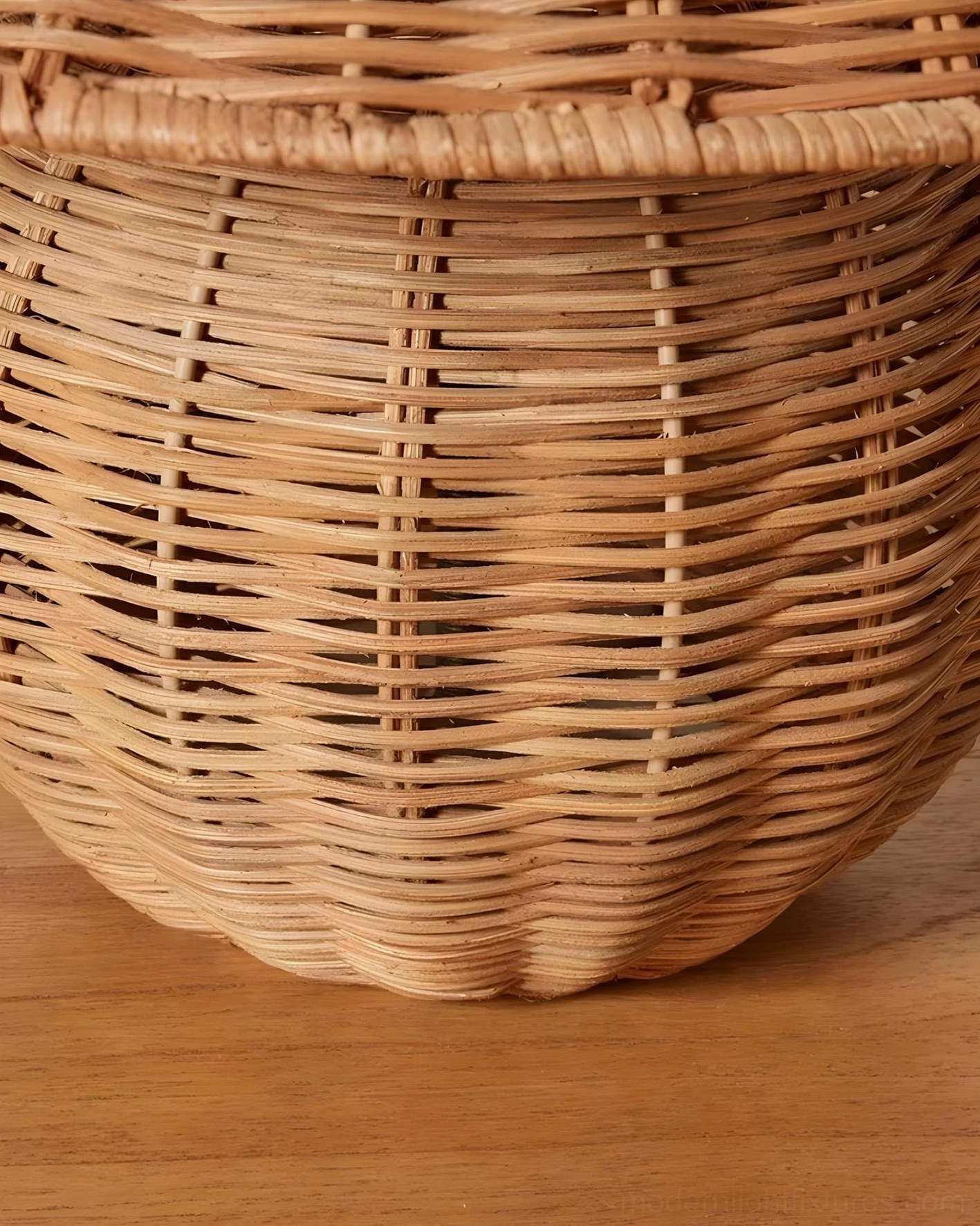 Rattan table lamp with natural hand-woven shade, close-up studio photography highlighting artisanal texture, fiber detail, and light diffusion qualities